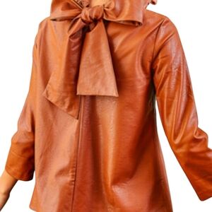 Tuckernuck faux leather brown bow top